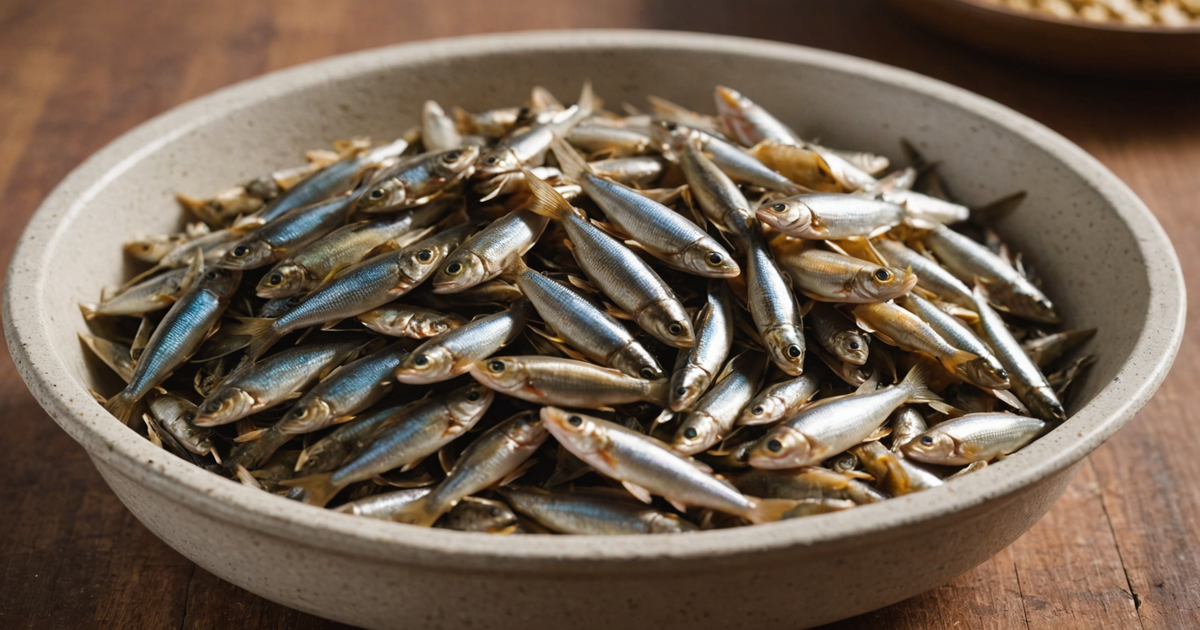 A close-up of freeze-dried minnows in a pet's food bowl